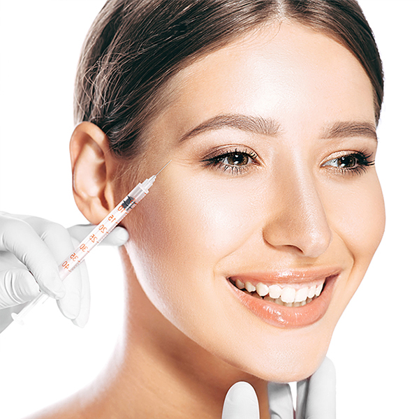 woman receiving a cosmetic filler injection