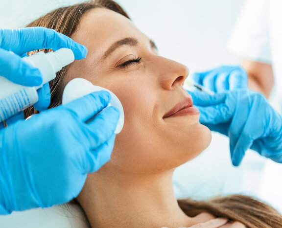 woman receiving a skin treatment